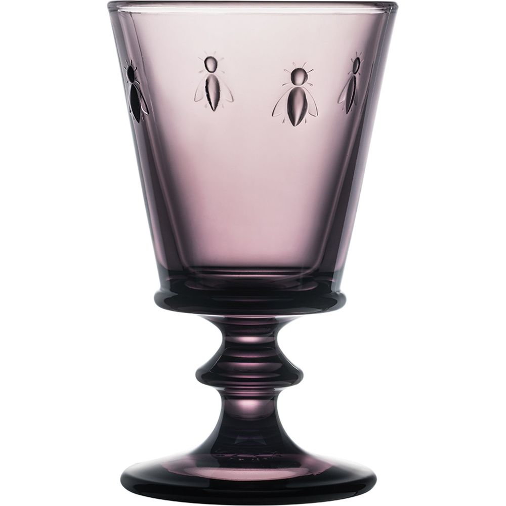 Glass goblet in amethyst hue with etched bee motifs on the bowl and a fluted stem