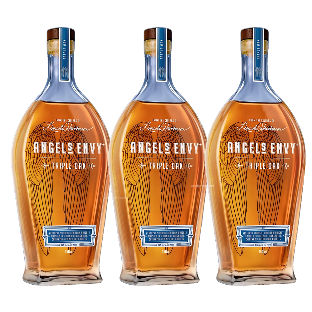Product photography of three identical Angel's Envy Triple Oak Kentucky Straight Bourbon Whiskey bottles, each with amber liquid, a prominent golden angel wings design, a blue neck label, cork stopper, and details on finishing in Hungarian, Chinkapin, and French oak barrels