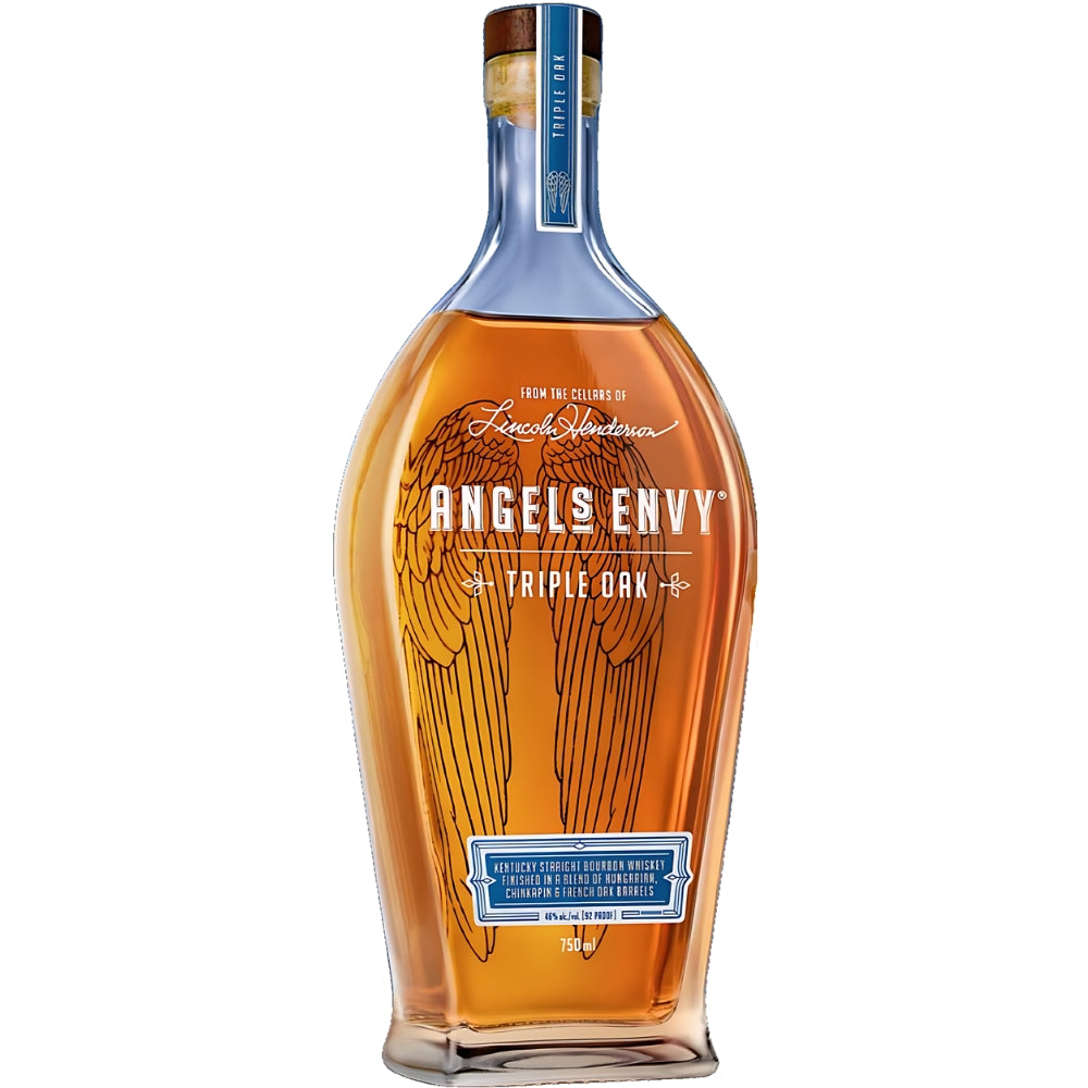 Product photograph of Angel's Envy Triple Oak bourbon by Lincoln Henderson showcasing a distinctively shaped bottle filled with rich amber liquid, featuring a prominent black angel wings graphic on the main label and a blue neck wrap with triple oak detail