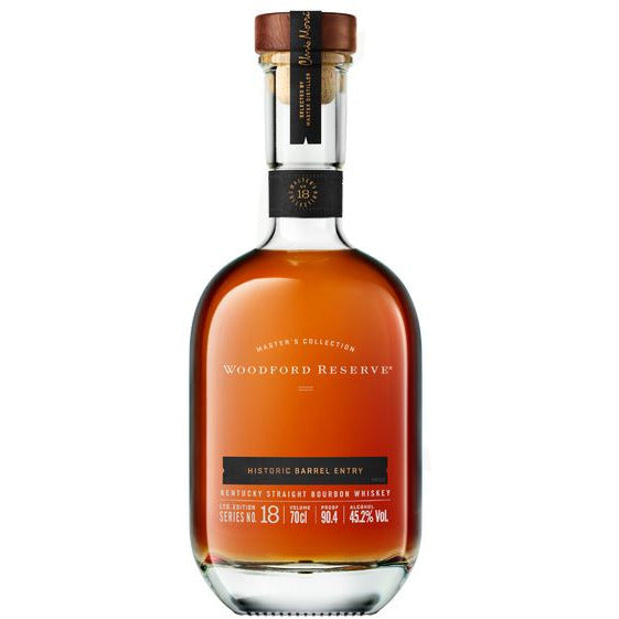 Woodford Reserve Master's Collection Historic Barrel Entry Kentucky Straight Bourbon Whiskey bottle featuring a rich amber liquid, cork stopper with Chris Morris signature, and a prominent black label indicating Series No 18 904 Proof