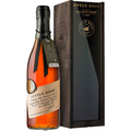 Product photograph of Little Book Chapter 03: The Road Home bourbon whiskey by Freddie Noe showing an amber liquid bottle with a craft paper label and black ribbon alongside a dark wooden display box with gold branding