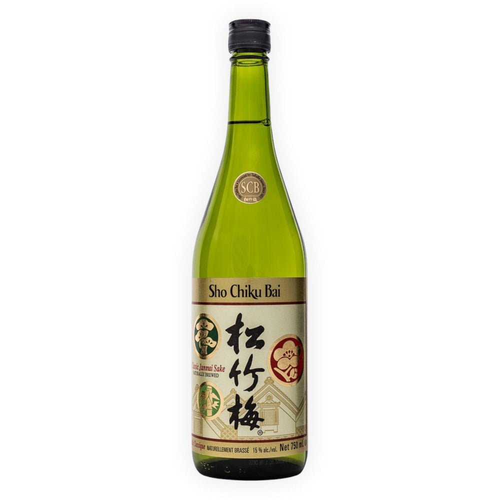 Product photography of a Sho Chiku Bai Junmai Sake bottle featuring a distinctive green glass and a richly detailed label with gold, red, and green pine, bamboo, and plum blossom motifs