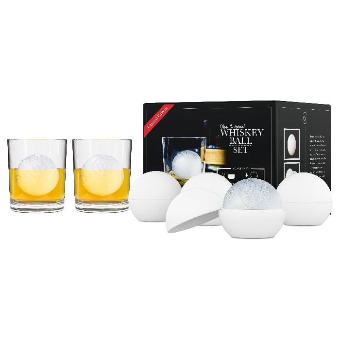 Product shot of a 'Limited Edition The Original Whiskey Ball Set' featuring two glasses of golden whiskey with spherical ice, a black retail box, and multiple white spherical ice molds, one open revealing a clear textured ice ball