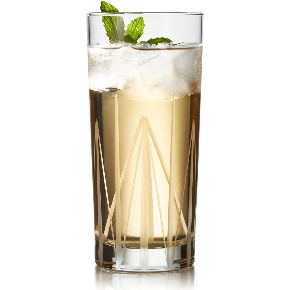 Photograph of a refreshing golden cocktail in a tall etched glass with ice and fresh green mint sprigs