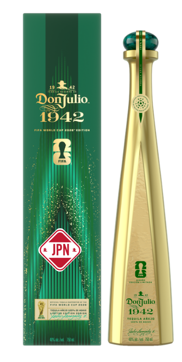 Product image of a Don Julio 1942 Tequila Anejo FIFA World Cup 2026 Limited Edition set featuring a tall golden bottle with a distinct teal cap and an emerald green presentation box adorned with gold speckles and a red JPN emblem