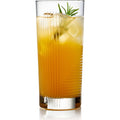 Digital photograph of an amber cocktail in a ribbed glass with ice and a green rosemary sprig on a white studio background