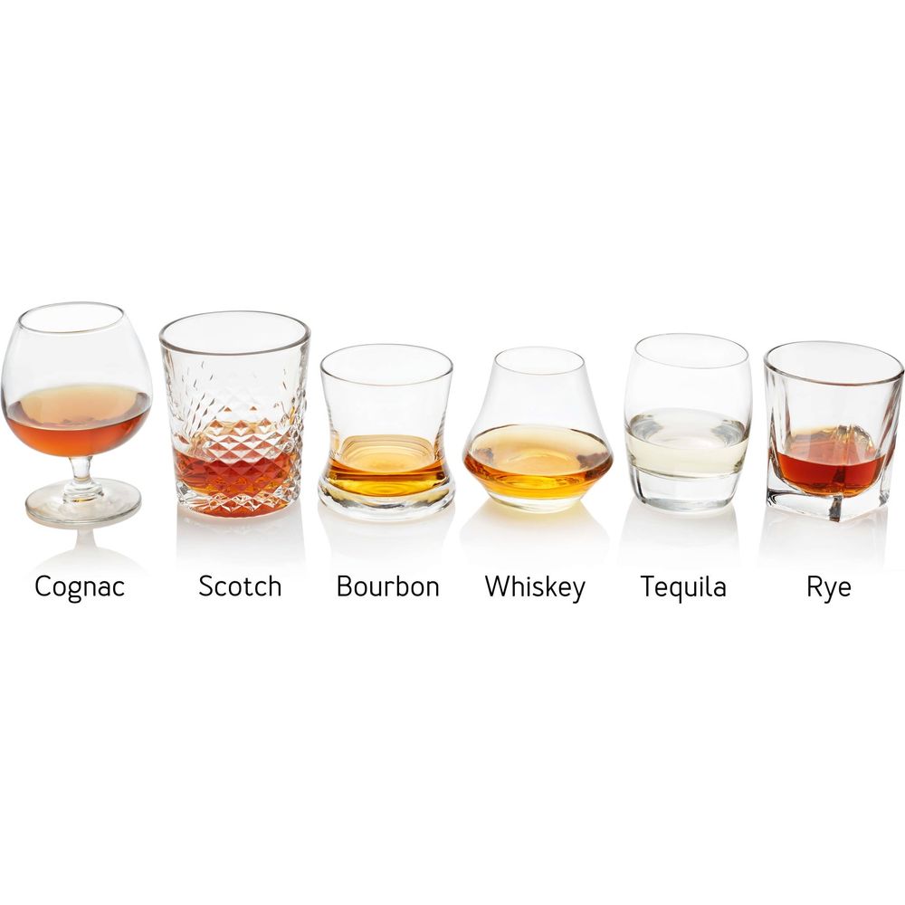 Studio photograph showing six distinct alcoholic spirits: amber cognac in a snifter, dark reddish scotch in a textured rocks glass, golden bourbon, light golden whiskey in a tulip taster glass, clear tequila, and reddish rye, each prominently labeled on a pristine white background